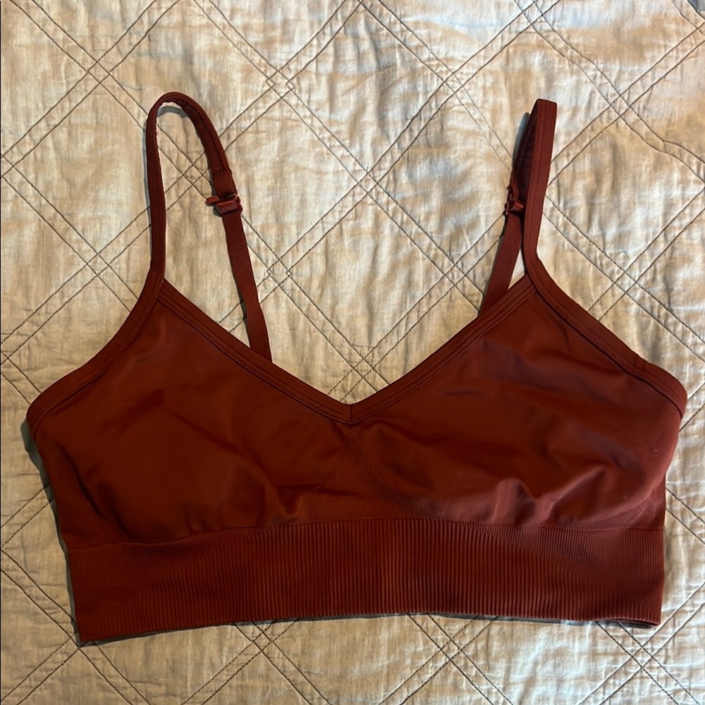 Lululemon Womens Ebb To Street Bra sz 10 Rust Color